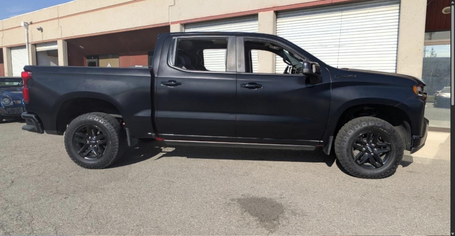 Chevy Silverado Z71 in a full satin black vinyl wrap by Kingdom Wraps & Coatings in Bakersfield, CA